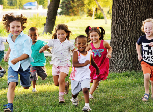 kids running on grass