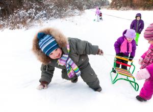 Children playing in snow.