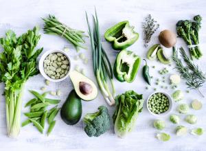 A variety of foods that are green in colour on a white background.