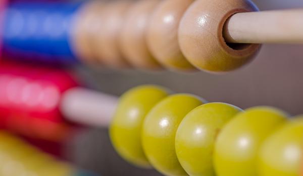 A close up picture of an abacus.