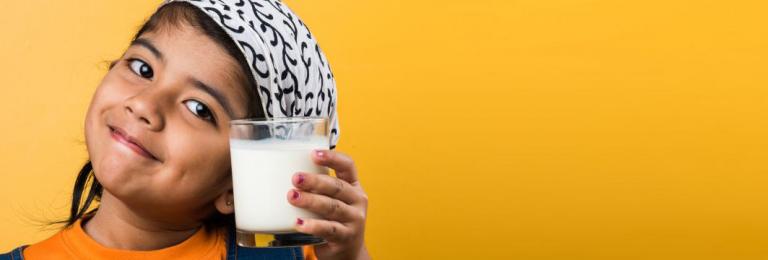Child drinking 3.25 homogenized milk