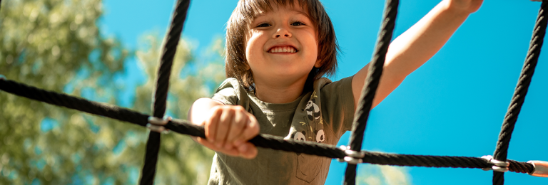 boy playing in playground