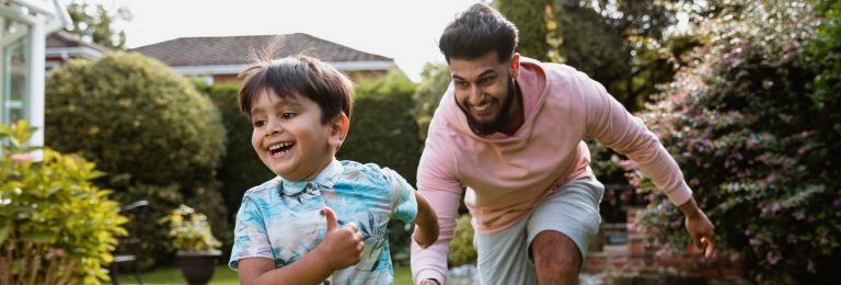 adult playing with child