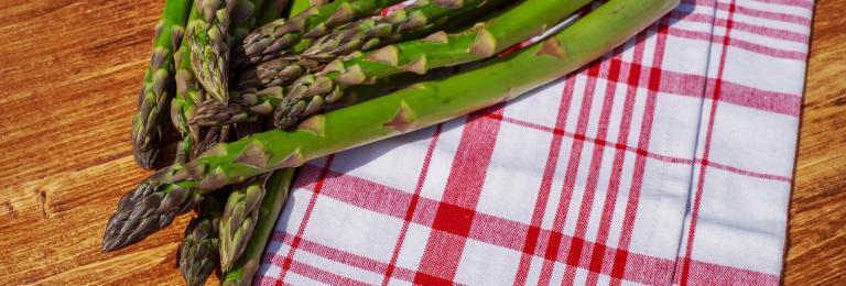 Asparagus spears on a table.