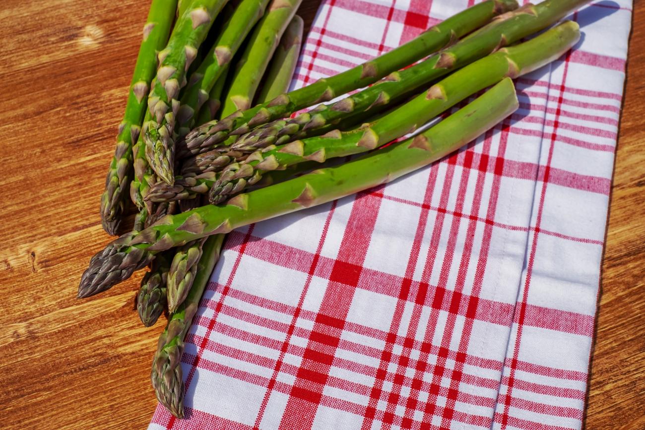 Asparagus spears on a table.